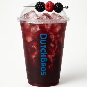 Tall clear Dutch Bros cup of reddish-purple Astronaut iced tea with blackberry, raspberry, almond swirl, fruit garnish, and white background.

