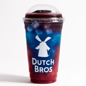 Dragon Slayer Dutch Bros Rebel with raspberry, blue raspberry, and blackberry float in a blue cup on a white background.

