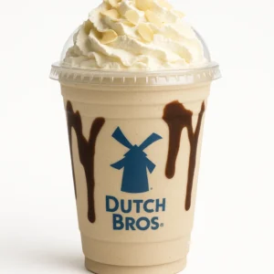Dutch Bros Almond Bar Shake on a white background with whipped cream, chocolate drizzle, and almond flakes.