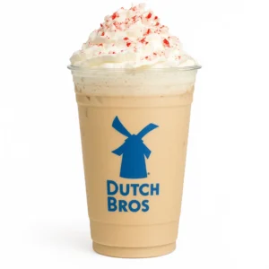 Dutch Bros Candy Cane Breve with whipped cream and crushed peppermint on a white background

