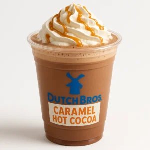 Dutch Bros Caramel Hot Cocoa topped with whipped cream and caramel drizzle on white background