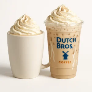 Dutch Bros Christmas Morning White Chocolate Chai Breve served hot and iced with whipped cream on a pure white background.

