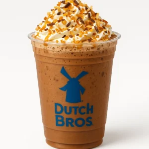 Dutch Bros German Chocolate Hot Cocoa with caramel, coconut, whipped cream, caramel drizzle, and chocolate garnish on white background