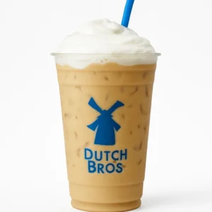 Dutch Bros Kicker iced Irish cream breve drink in a branded cup with soft top on white background

