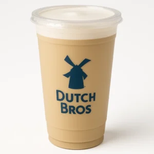  Dutch Bros Latte in a tall clear plastic cup with light tan coffee and foam on a white background