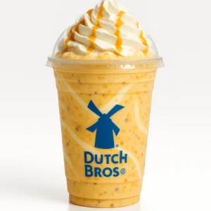 Dutch Bros Peach Cobbler Shake with peach, white chocolate, and chocolate macadamia nut on a white background.