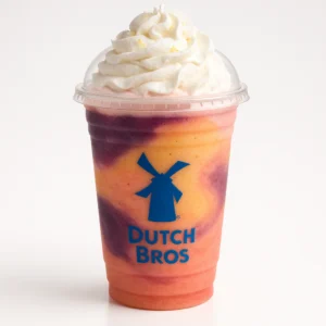 Dutch Bros Ray of Sunshine Shake with blackberry, peach, and grapefruit on a white background.