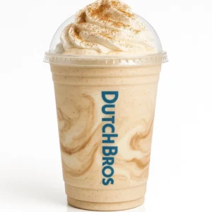 Dutch Bros Snickerdoodle Shake with cinnamon, chocolate macadamia nut, and white chocolate on a white background.