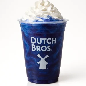 Dutch Bros Starry Night Shake with blue raspberry and blackberry on a white background.