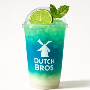 Dutch Mojito Dutch Bros Rebel with coconut, lime, and crème de menthe in a blue cup on a white background.

