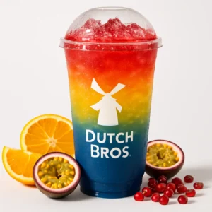 Hyperchrome Dutch Bros Rebel with orange, passion fruit, and pomegranate on a white background.

