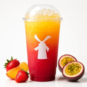 Palm Beach Dutch Bros Rebel with strawberry, peach, and passion fruit on a white background.

