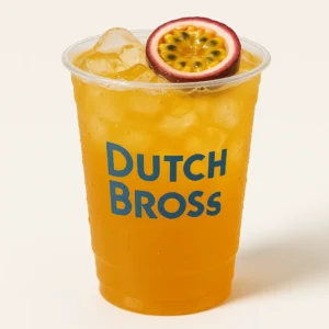 Clear plastic cup of golden passion fruit iced tea with ice cubes, passion fruit garnish, and Dutch Bros logo on a white background.

