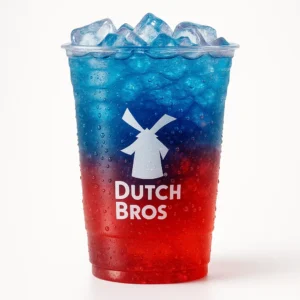 “Dutch Bros Astronaut Soda in a clear branded cup with blue and red colors on a white background.”