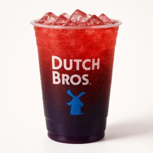 “Dutch Bros Dragon Slayer Soda in a clear branded cup with red and purple layers on a white background.”