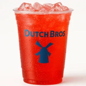 “Dutch Bros Strawberry Sparkling Soda in a clear branded cup with ice and bubbles on a white background.”