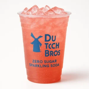 Dutch Bros Strawberry Zero Sugar Sparkling Soda in a clear branded cup with ice on a white background.